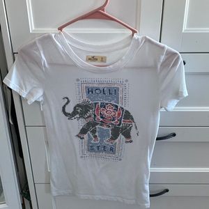 It has a elephant on the front. It is a XS.